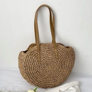 Cute round straw bag, perfect for a day out or beach trip